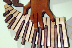 In-Good-Hands-piano-hand-detail-1200x956
